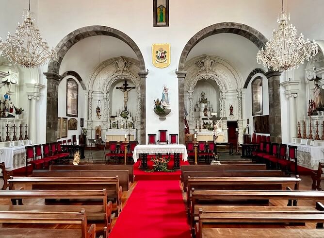 two altarpieces inside church